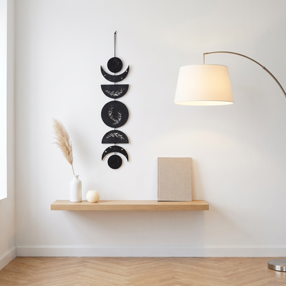 Black wooden moon phase wall art — full piece against white background, 78 cm length