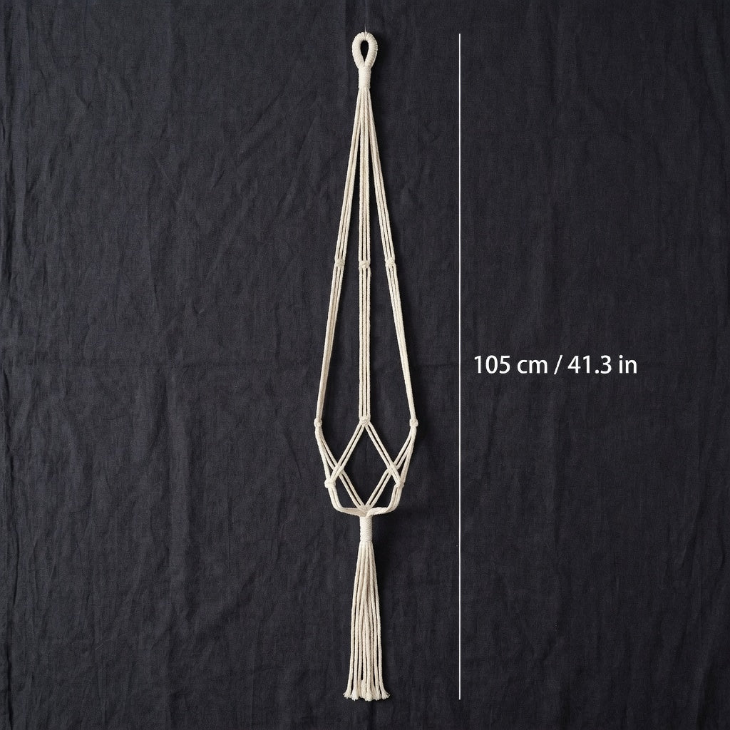 Minimalist macrame plant hanger flat lay measurement 105 cm 41 inches beige cotton rope white background
