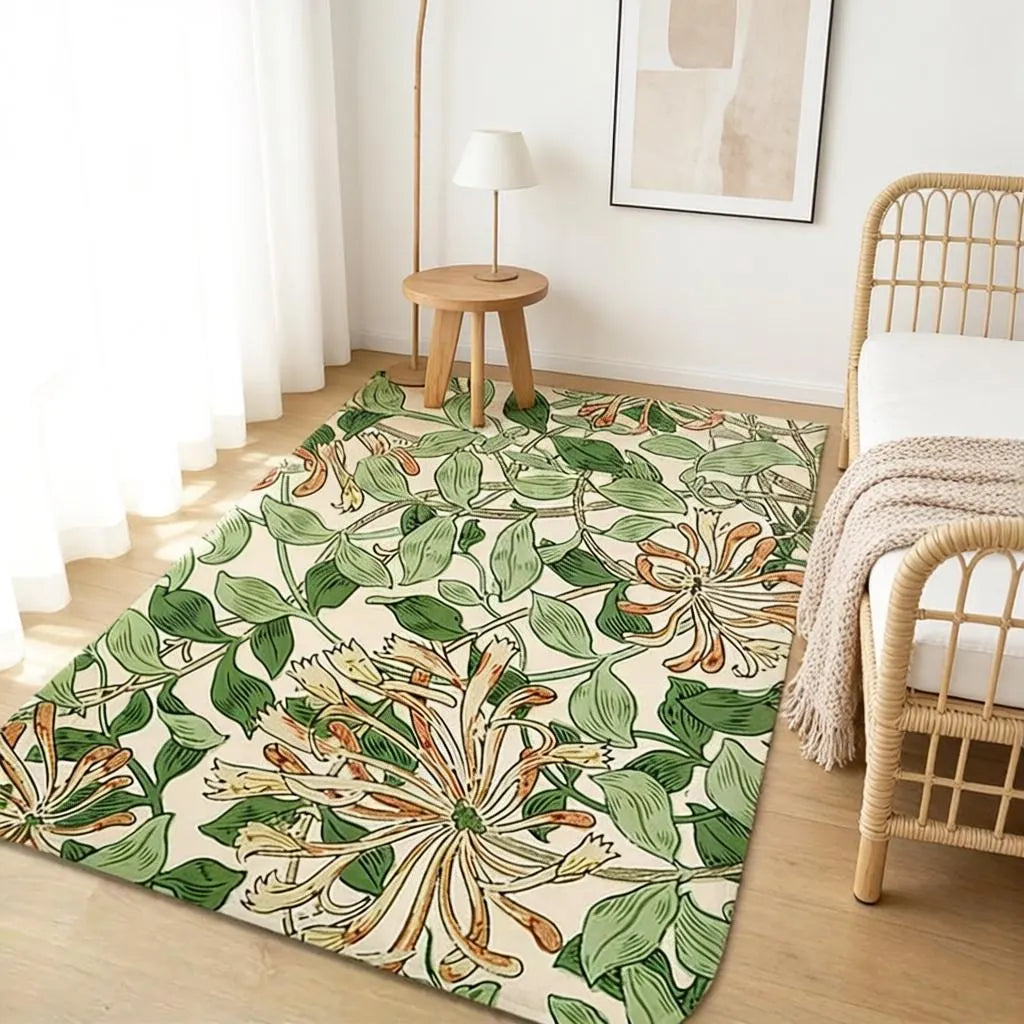 Sage green William Morris floral area rug displayed on a set of wooden stairs
