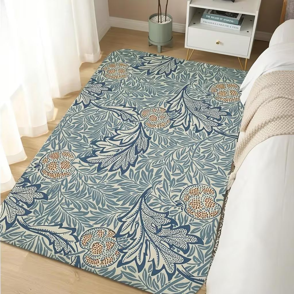 Teal blue William Morris area rug in a living room with a white sofa and staircase in the background
