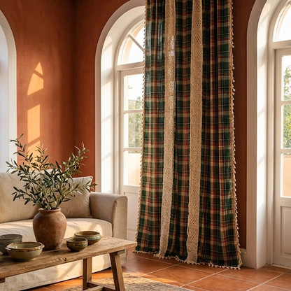 Green buffalo plaid crochet lace curtain in a French Provençal stone cottage dining room with warm honey walls