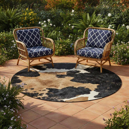 Cow print round rug in black and white — western farmhouse carpet, main view