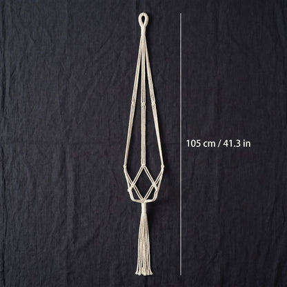 Minimalist macrame plant hanger flat lay measurement 105 cm 41 inches beige cotton rope white background