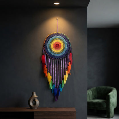 Rainbow crochet dreamcatcher on dark charcoal wall, bohemian feather wall art for living room decor