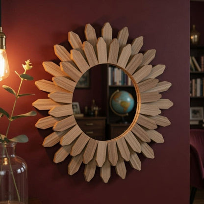 Round wood sunflower mirror catching warm light — boho farmhouse wall decor for entryway or hallway