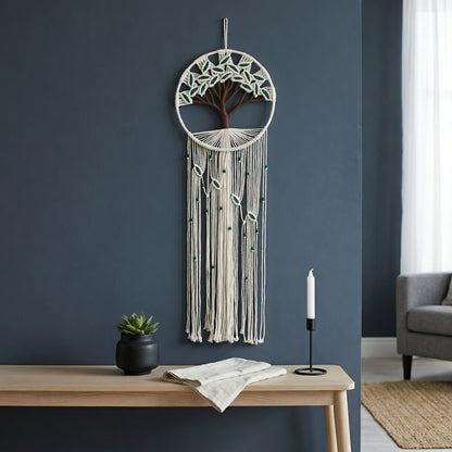 Boho macrame tree of life wall hanging in home office, slate blue wall, green leaf fringe cotton rope nature wall art